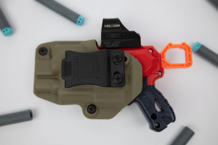 Weapon with a red grip and black accents on a white background