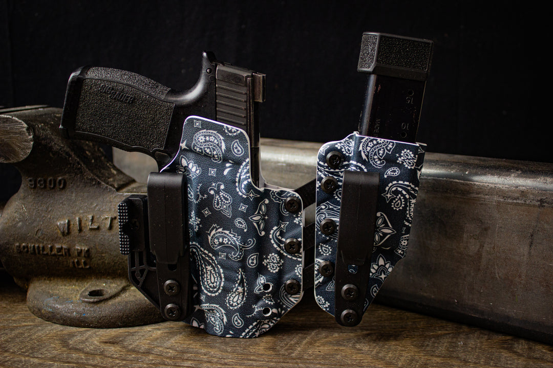 Right-handed Entrada holster for Sig P365 XL in April 2025 Paisley print, shown with firearm and magazine inserted. Includes ModWing and Griphook belt clips.