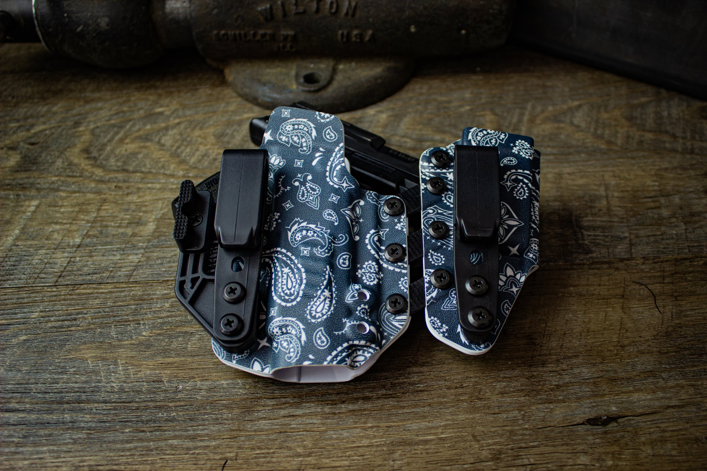 Right-handed Entrada holster for Sig P365 XL in April 2025 Holster of the Month Paisley print. Shown with ModWing and Griphook belt clips.